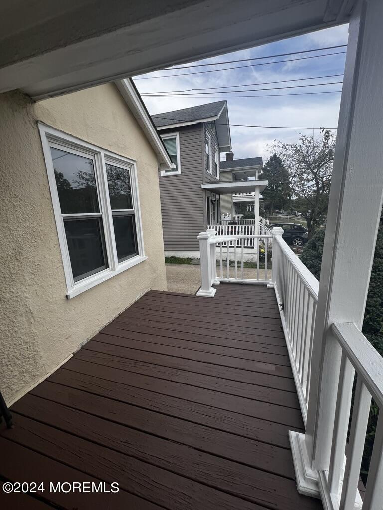 615 2nd Avenue, Unit 1 Asbury Park, NJ 07712 - Photo 5 of 39 a view of a house with wooden deck