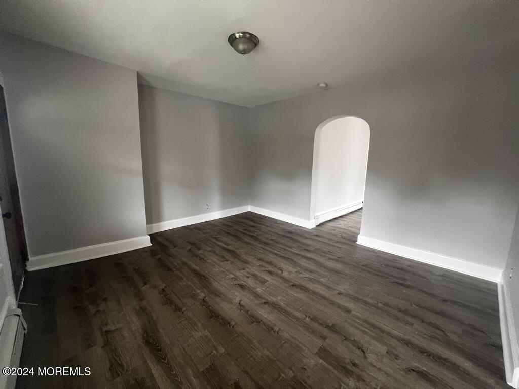 615 2nd Avenue, Unit 1 Asbury Park, NJ 07712 - Photo 7 of 39 a view of empty room with wooden floor