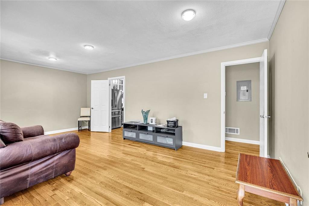 349 Virginia Place Southeast Marietta, GA 30067 - Photo 11 of 37 a living room with furniture and wooden floor
