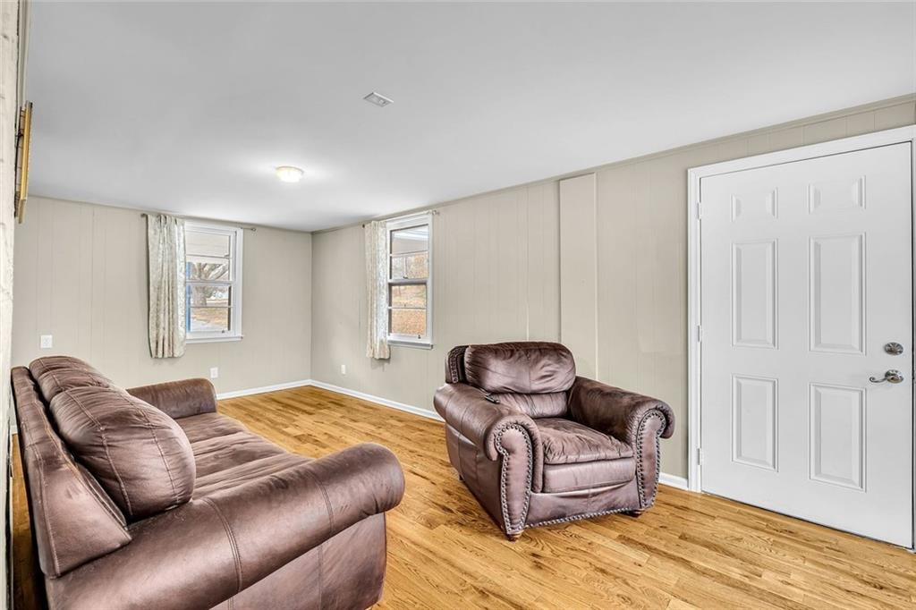 349 Virginia Place Southeast Marietta, GA 30067 - Photo 17 of 37 a bedroom with a bed and glass window