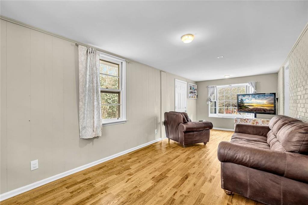 349 Virginia Place Southeast Marietta, GA 30067 - Photo 19 of 37 a living room with furniture and a window