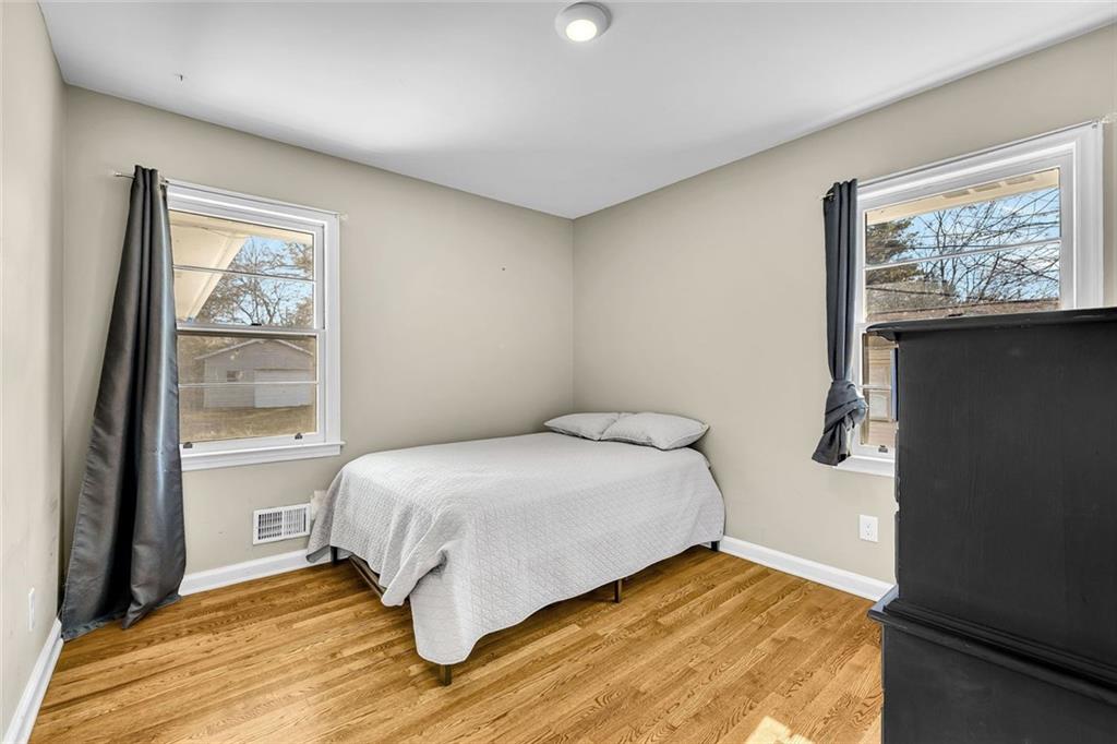 349 Virginia Place Southeast Marietta, GA 30067 - Photo 26 of 37 a bedroom with a bed and a window