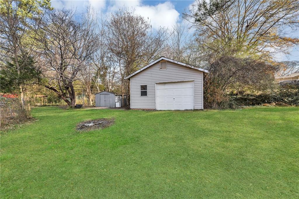 349 Virginia Place Southeast Marietta, GA 30067 - Photo 34 of 37 a front view of house with yard and green space