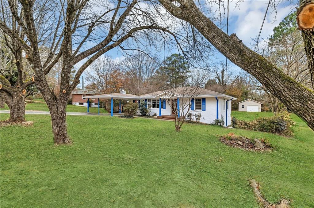 349 Virginia Place Southeast Marietta, GA 30067 - Photo 4 of 37 a view of house with outdoor space