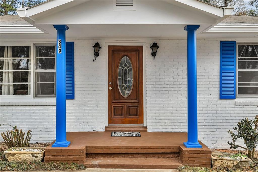 349 Virginia Place Southeast Marietta, GA 30067 - Photo 8 of 37 a front view of a house with street