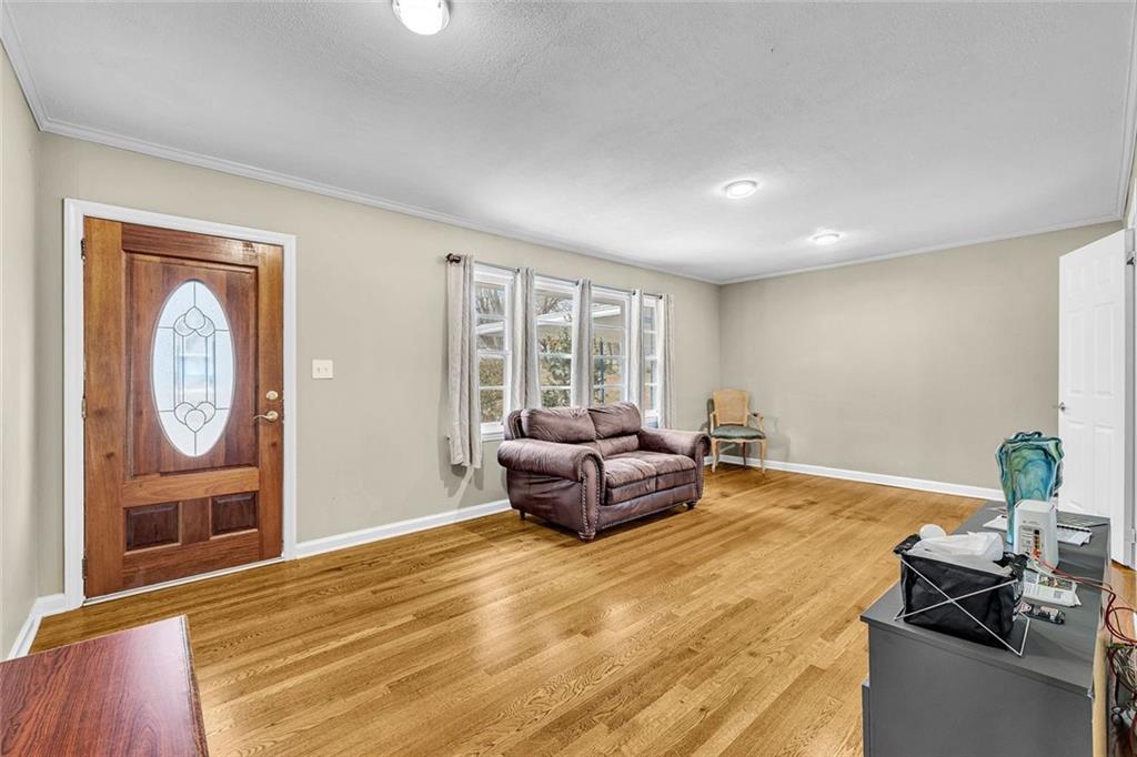 349 Virginia Place Southeast Marietta, GA 30067 - Photo 9 of 37 a living room with furniture and a window