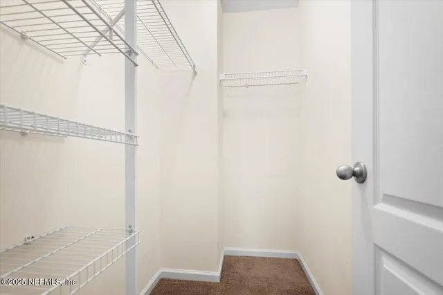 a view of small space with racks on the wall