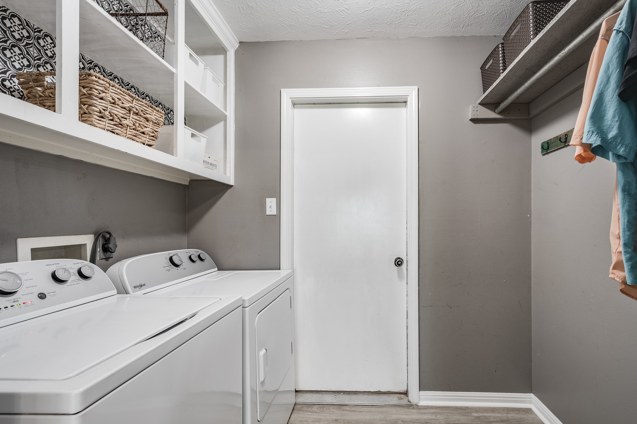 16392 Many Trees Lane Conroe, TX 77302 - Photo 25 of 33 The cutest laundry room, with a place for everything off the garage