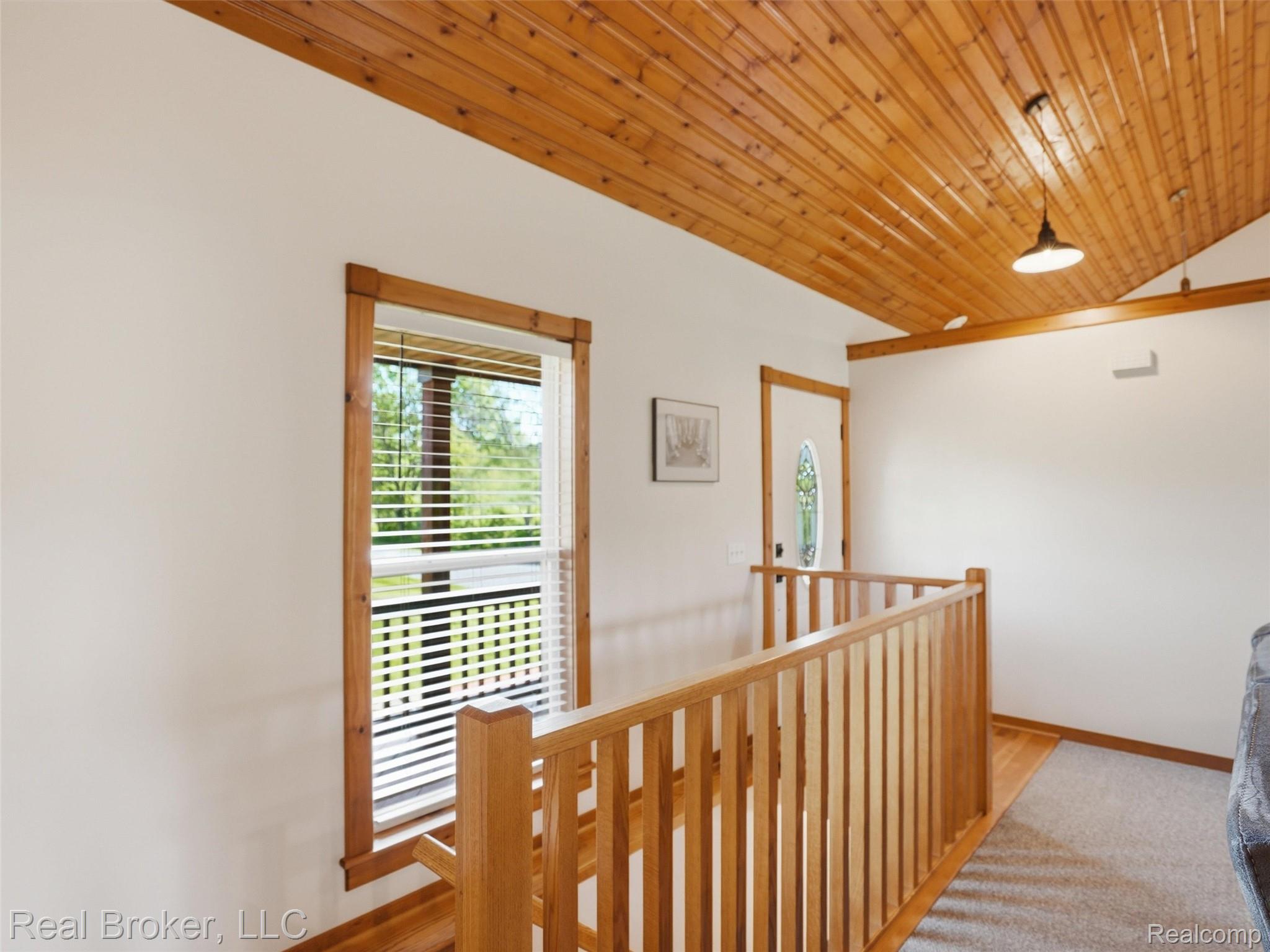 7271 West Ray Road Gaines, MI 48436 - Photo 17 of 48 Vaulted wood-plank ceiling with exposed beams