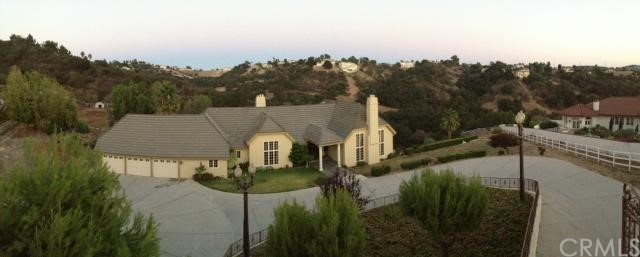 2176 Rocky View Road Diamond Bar, CA 91765 - Photo 1 of 1 a view of a town with mountains in the background