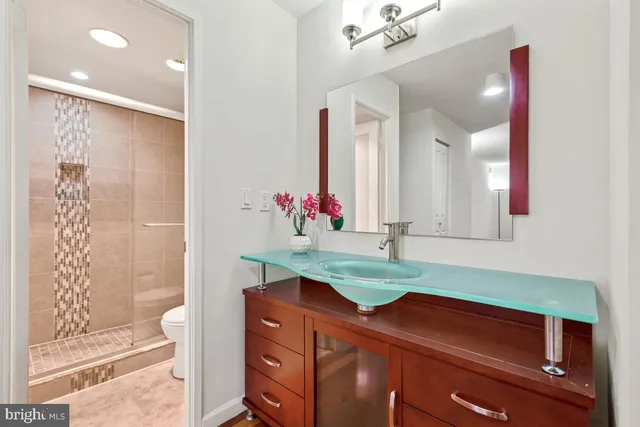 a view of a roof deck with couches