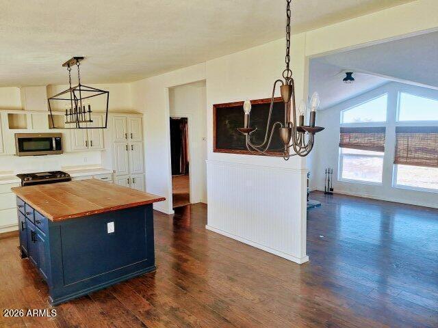 1595 Bourdon Ranch Road Show Low, AZ 85901 - Photo 13 of 41 a kitchen with stainless steel appliances granite countertop a stove a refrigerator and a view of living room