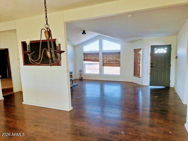 1595 Bourdon Ranch Road Show Low, AZ 85901 - Photo 18 of 41 a view of a room with wooden floor fireplace and windows