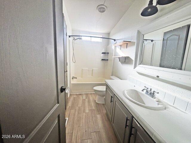 1595 Bourdon Ranch Road Show Low, AZ 85901 - Photo 29 of 41 a bathroom with a sink a toilet and shower