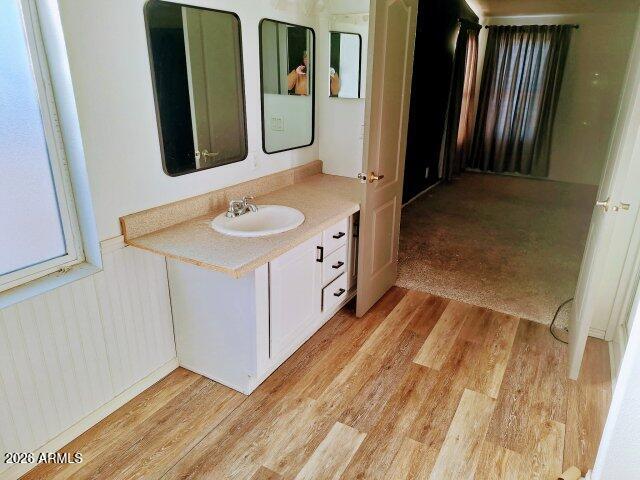 1595 Bourdon Ranch Road Show Low, AZ 85901 - Photo 35 of 41 a bathroom with a sink and a mirror
