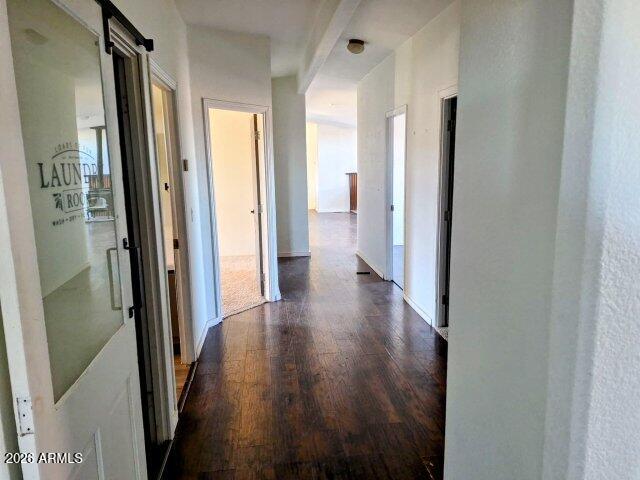 1595 Bourdon Ranch Road Show Low, AZ 85901 - Photo 36 of 41 a view of a hallway with wooden floor