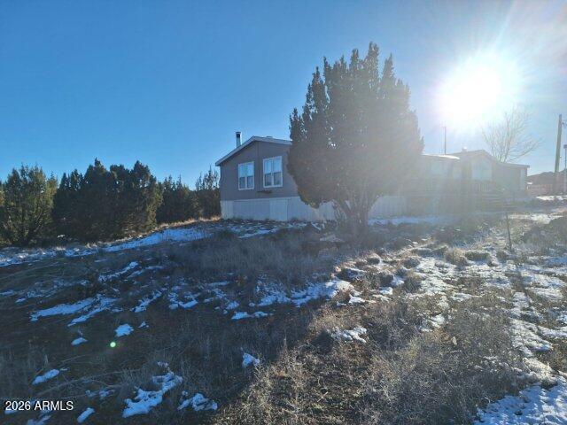 1595 Bourdon Ranch Road Show Low, AZ 85901 - Photo 40 of 41 a view of a house with a yard