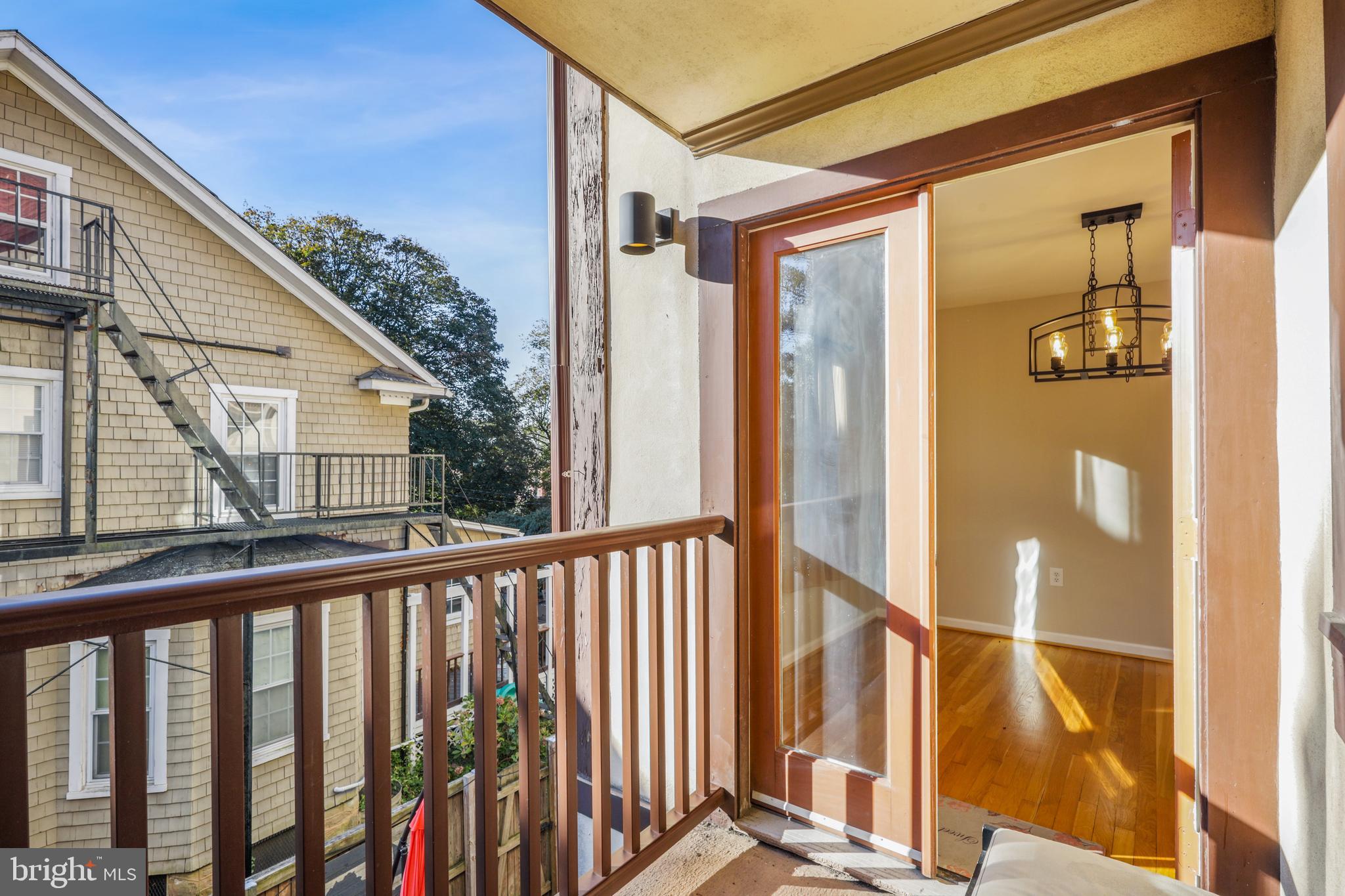 4202 Roland Avenue, Unit 202 Baltimore, MD 21211 - Photo 14 of 29 1st floor balcony off dining room
