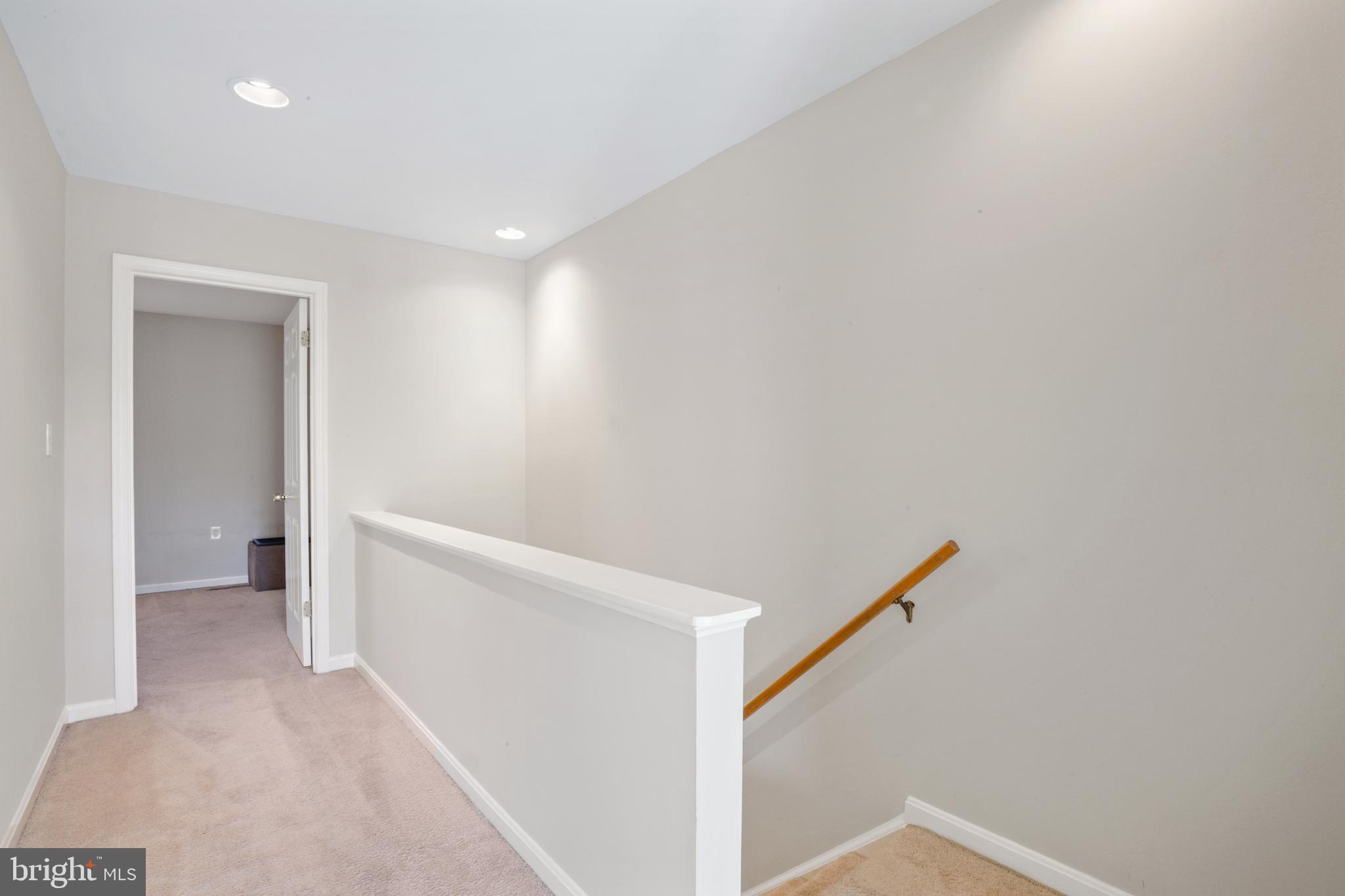 4202 Roland Avenue, Unit 202 Baltimore, MD 21211 - Photo 15 of 29 Hallway to two primary bedrooms
