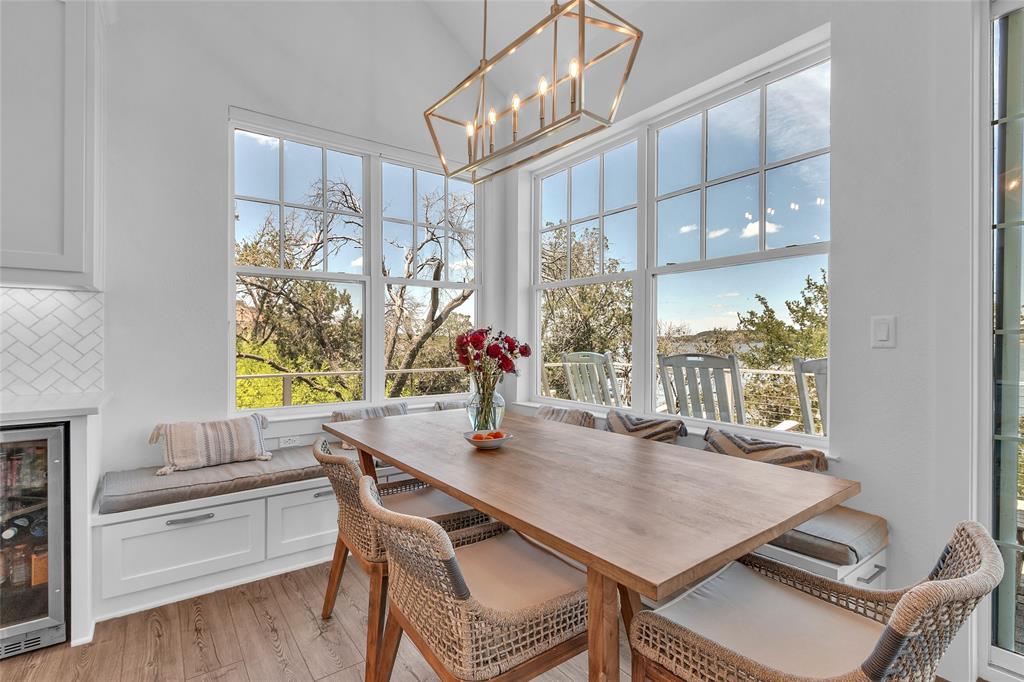 2147 Trail Rdg 2 Graford, TX 76449 - Photo 14 of 37 a view of a dining room with furniture window and wooden floor