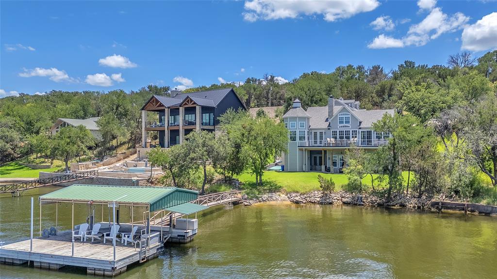 2147 Trail Rdg 2 Graford, TX 76449 - Photo 2 of 37 an aerial view of a house with swimming pool outdoor seating and yard