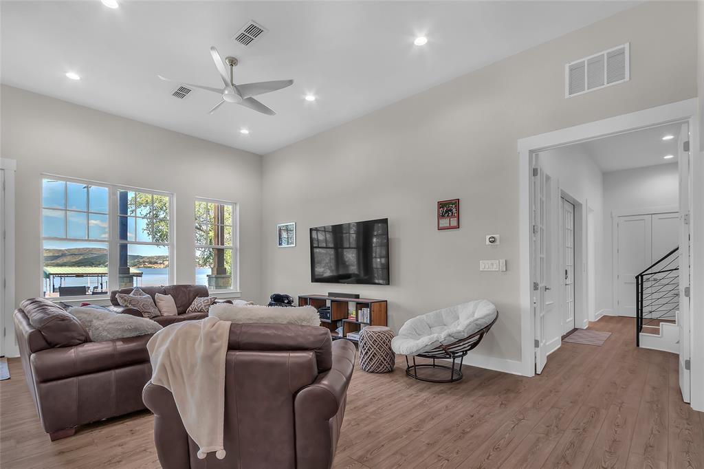 2147 Trail Rdg 2 Graford, TX 76449 - Photo 21 of 37 a living room with furniture and a flat screen tv