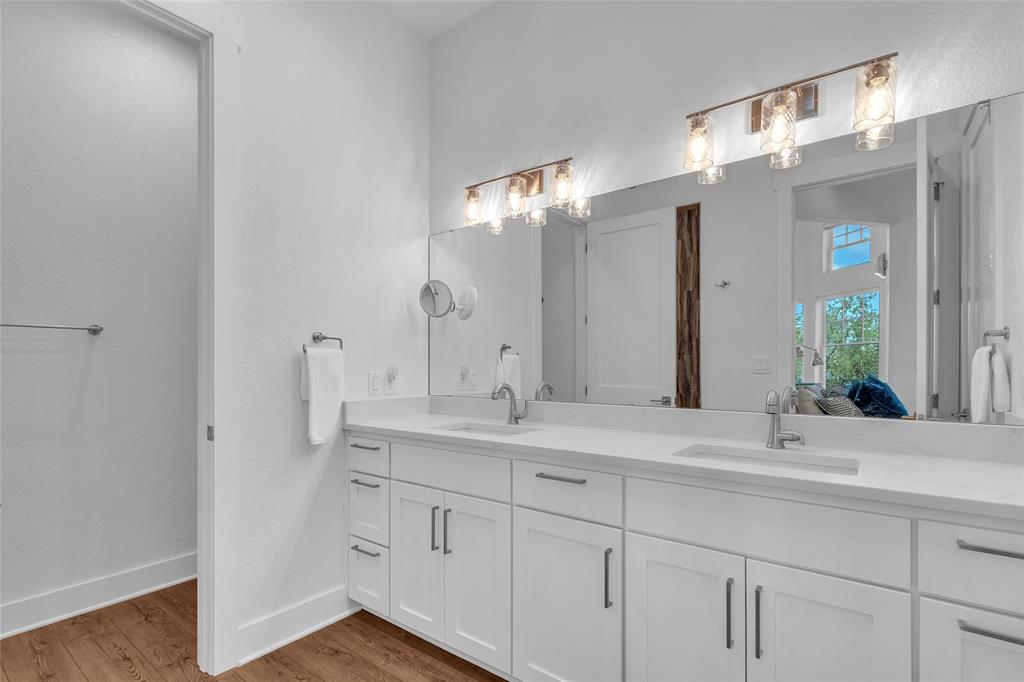 2147 Trail Rdg 2 Graford, TX 76449 - Photo 25 of 37 a bathroom with a sink and a mirror