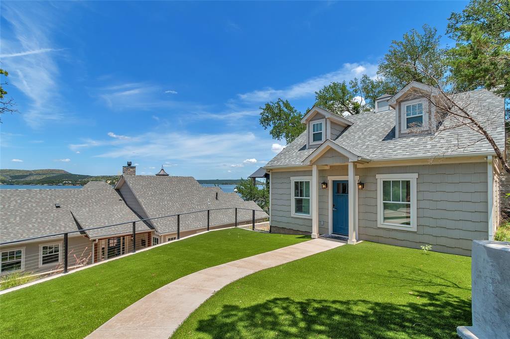 2147 Trail Rdg 2 Graford, TX 76449 - Photo 27 of 37 a front view of a house with garden