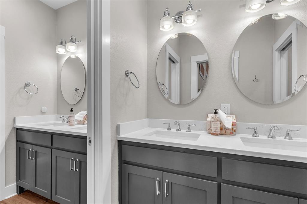 2147 Trail Rdg 2 Graford, TX 76449 - Photo 31 of 37 a bathroom with double vanity sinks and a mirror