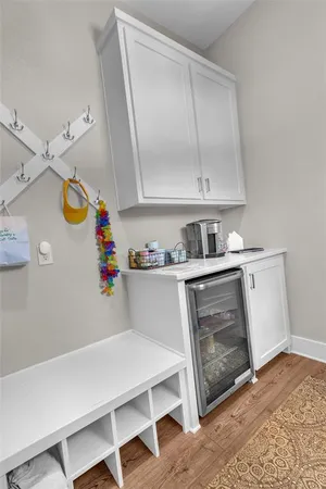 a room with cabinets and wooden floor