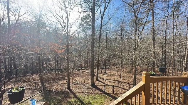 a view of a balcony with a bench