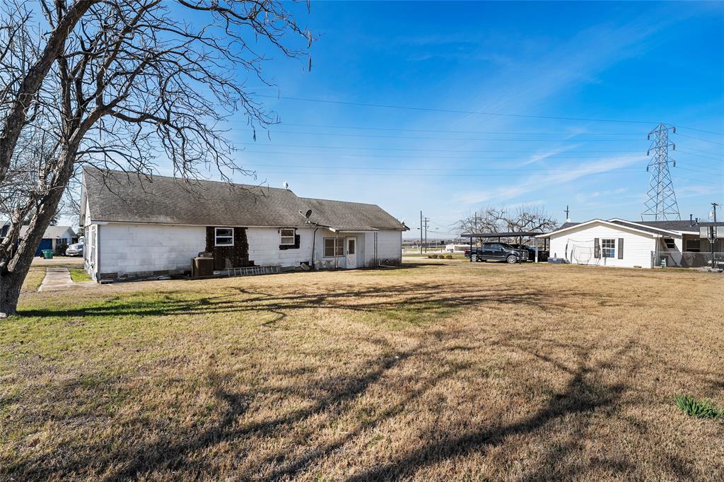 310 3rd Street Abbott, TX 76621 - Photo 23 of 23 a front view of a house with a yard