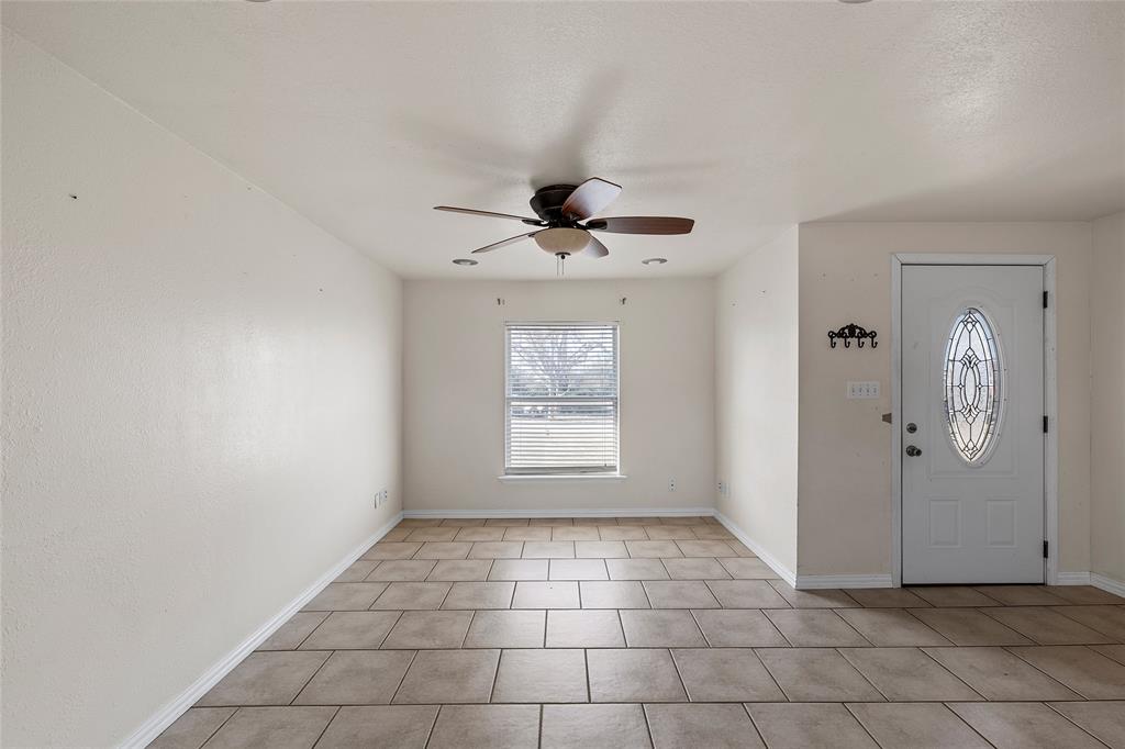 310 3rd Street Abbott, TX 76621 - Photo 3 of 23 a view of an empty room and window