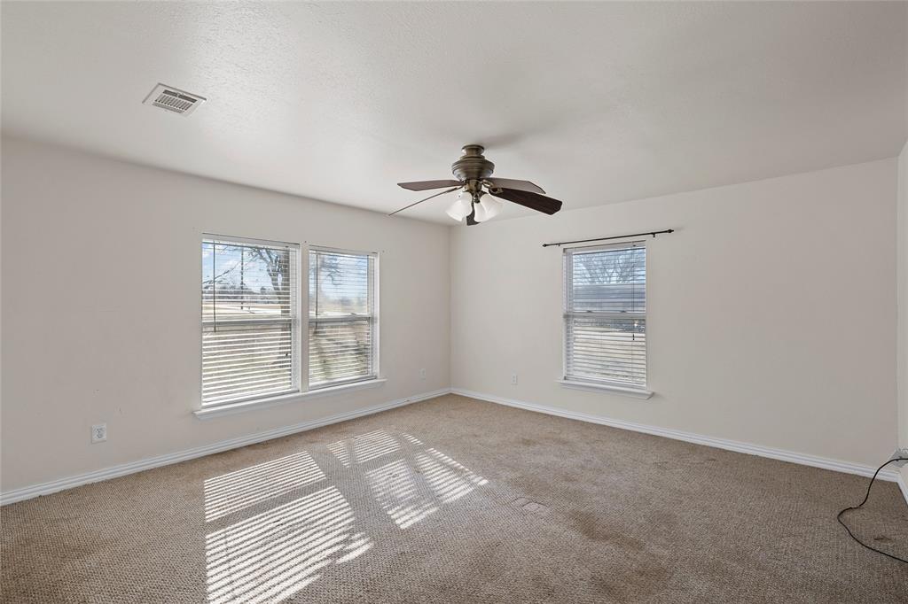 310 3rd Street Abbott, TX 76621 - Photo 9 of 23 a view of an empty room with a window