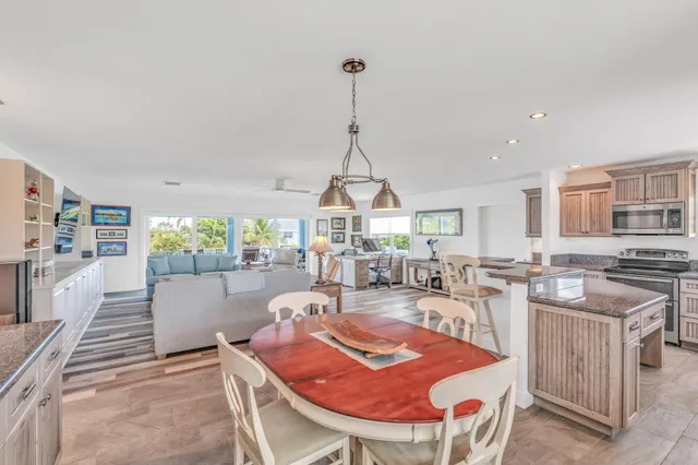 a outdoor space with furniture and a chandelier