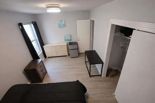 a spacious bathroom with a double vanity sink and a bathtub