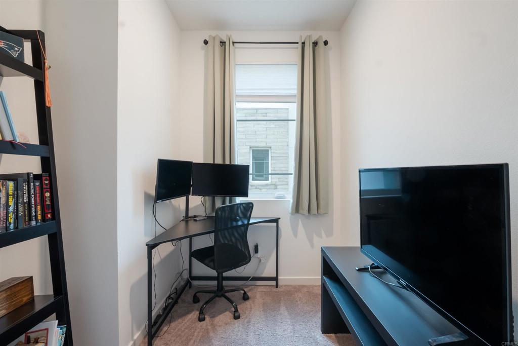 522 South Cleveland Street, Unit 7 Oceanside, CA 92054 - Photo 13 of 24 a view of a workspace with furniture and a window