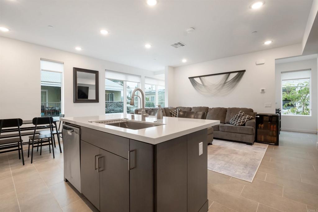 522 South Cleveland Street, Unit 7 Oceanside, CA 92054 - Photo 22 of 24 a kitchen with a sink and a refrigerator