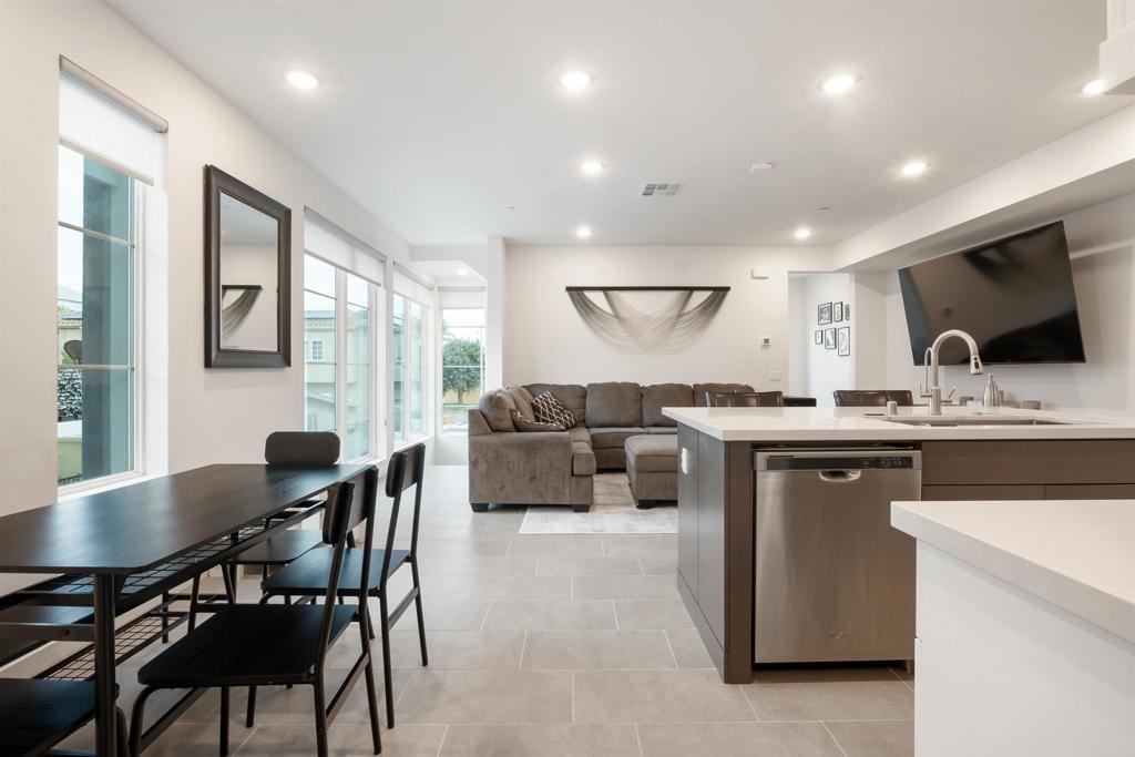 522 South Cleveland Street, Unit 7 Oceanside, CA 92054 - Photo 6 of 24 a living room with furniture and a flat screen tv