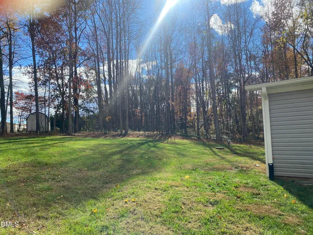 a view of back yard of the house