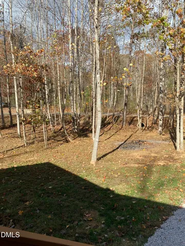 a view of kitchen and dining room with wooden floor
