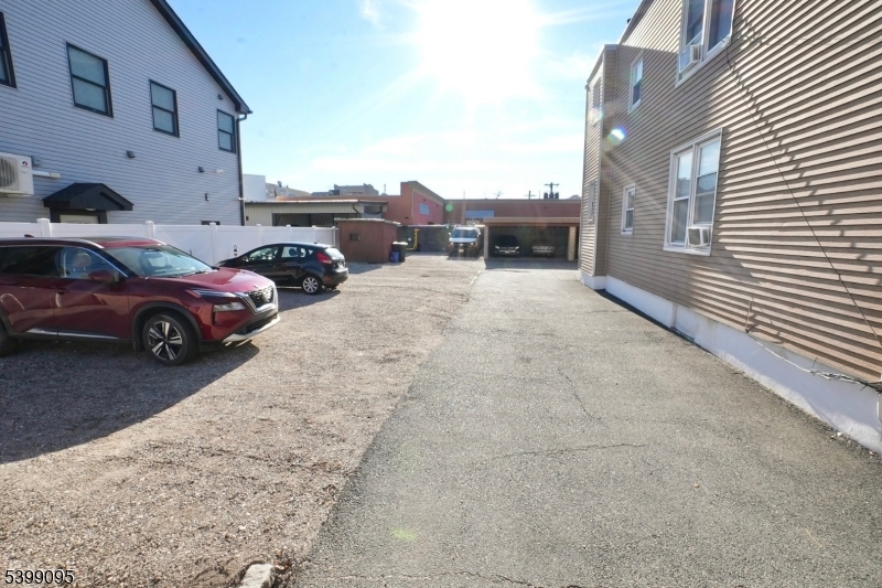 125 Malvern Street Newark, NJ 07105 - Photo 4 of 18 a view of street with parked cars