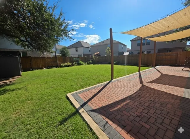 a view of a backyard with a slide