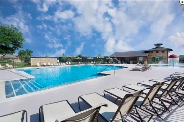 a view of swimming pool and lake view