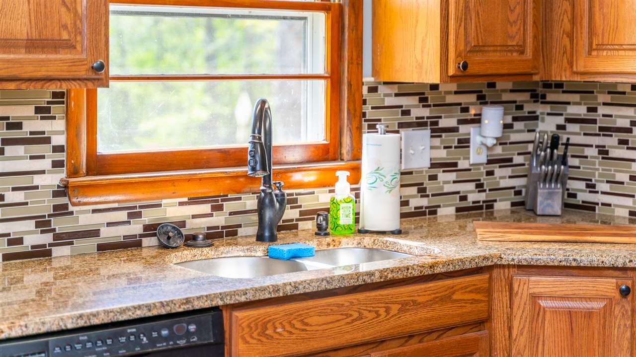 275 Swoope Road Swoope, VA 24479 - Photo 22 of 41 a kitchen with a sink and a large window