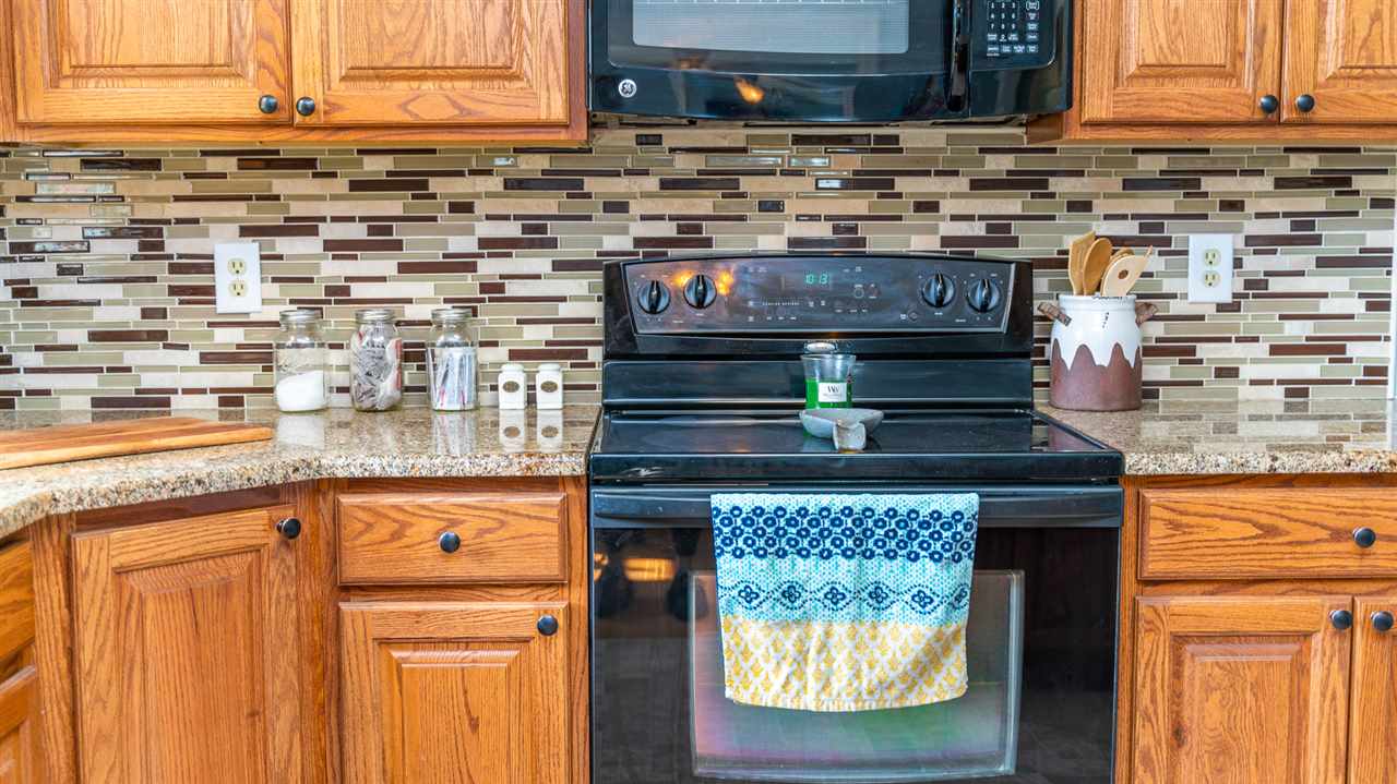 275 Swoope Road Swoope, VA 24479 - Photo 25 of 41 a kitchen with stainless steel appliances granite countertop a stove and a sink