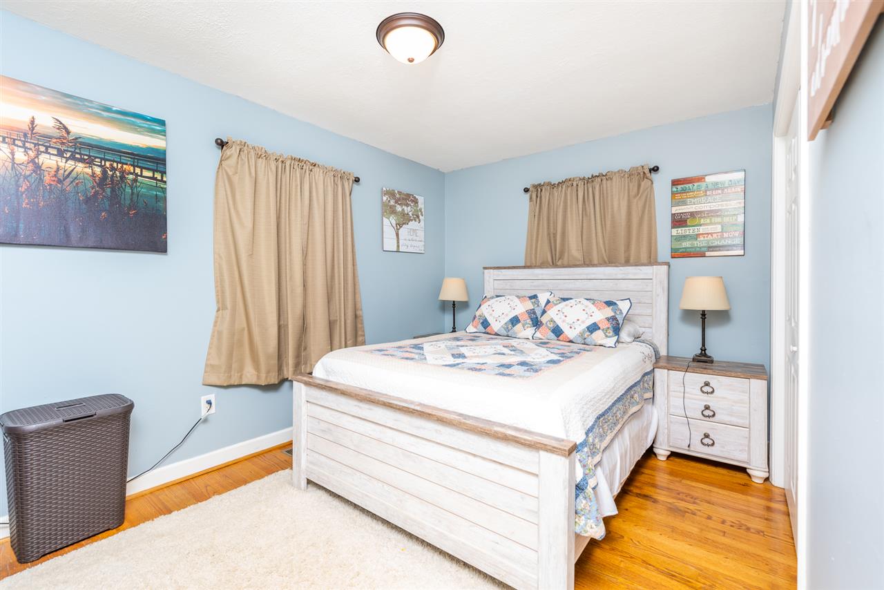 275 Swoope Road Swoope, VA 24479 - Photo 27 of 41 a bed sitting in a bedroom next to a window
