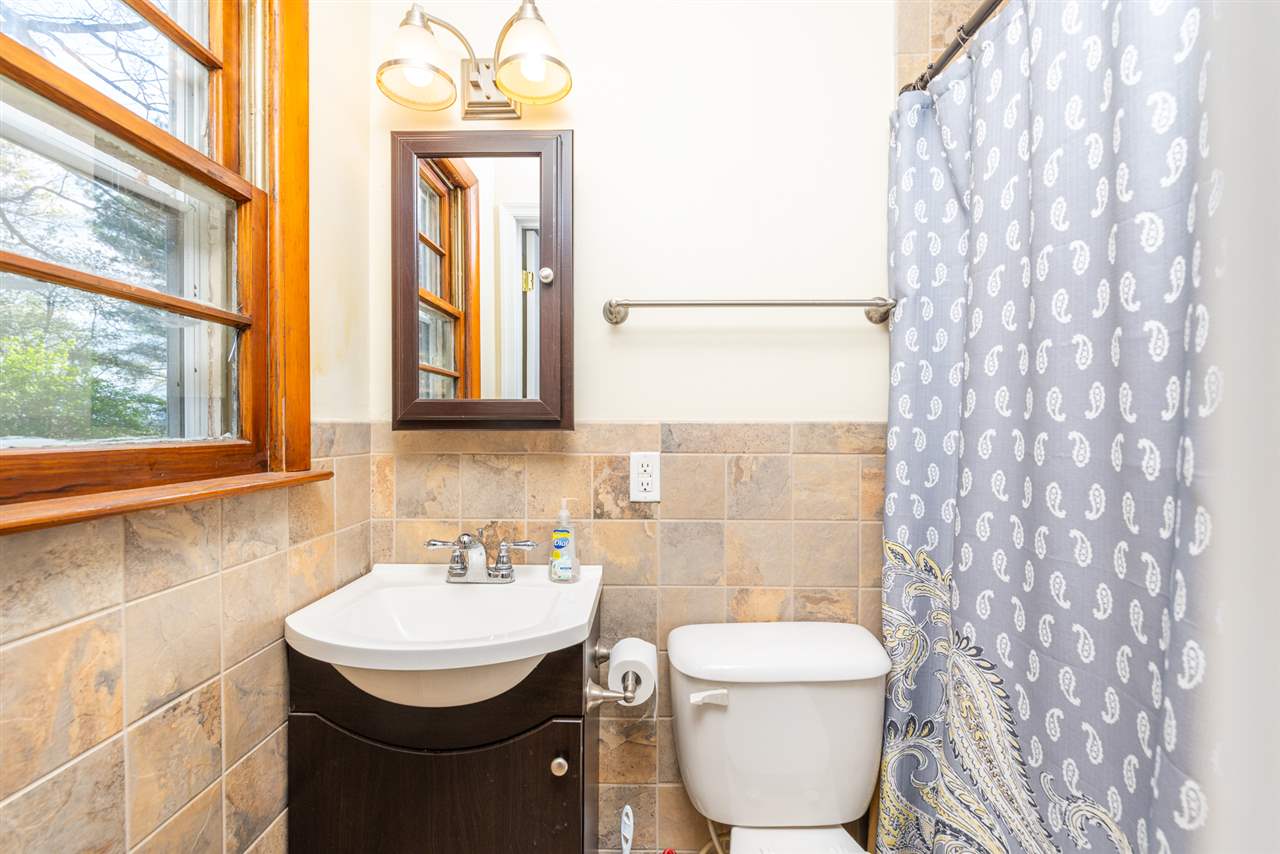 275 Swoope Road Swoope, VA 24479 - Photo 31 of 41 a bathroom with a toilet sink and mirror