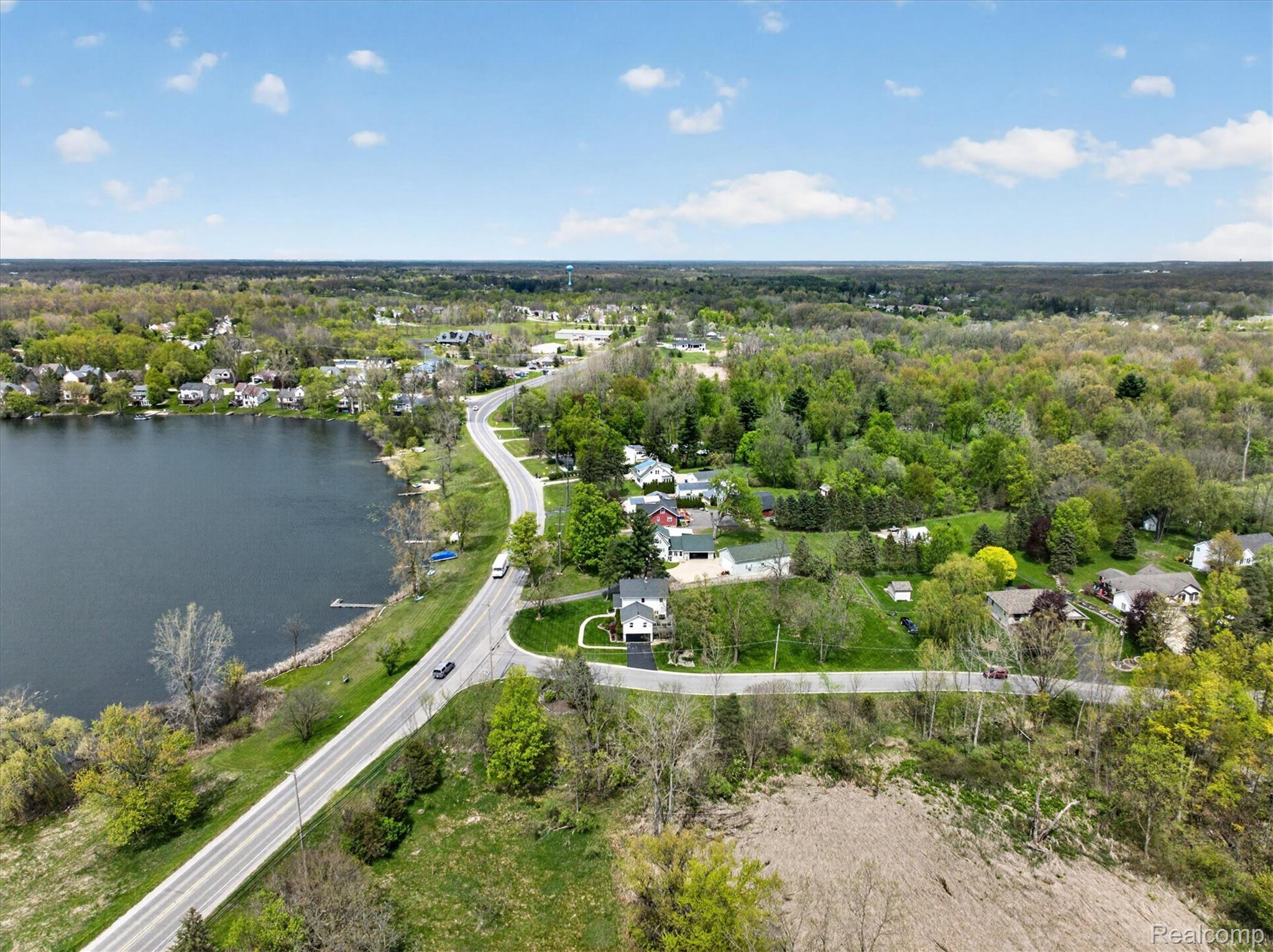 12409 Fenton Road Fenton, MI 48430 - Photo 53 of 61 Drone / aerial view of a nearby body of water