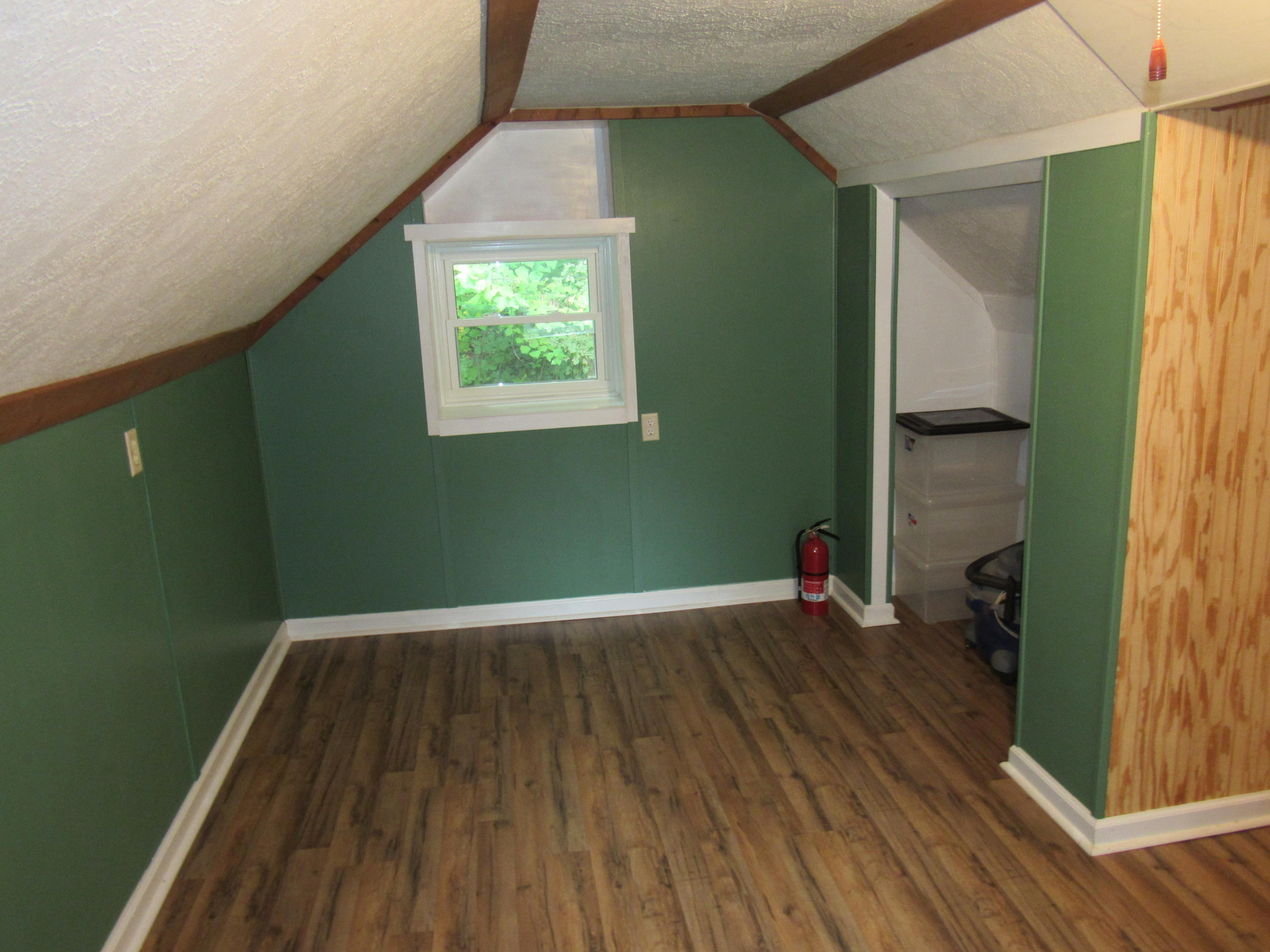 2700 Johnny's Ridge Road Ferrum, VA 24088 - Photo 14 of 32 a view of a room with wooden floor and a window